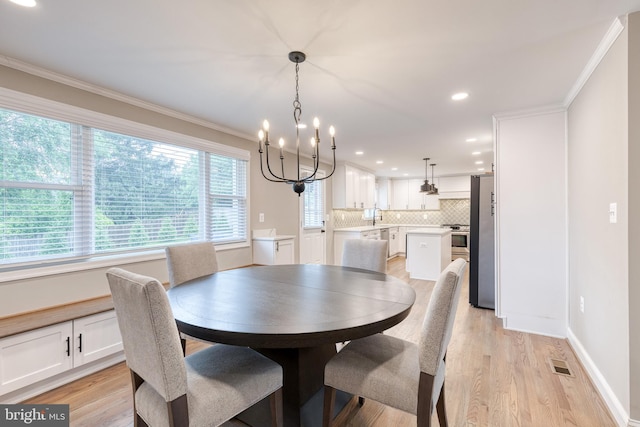 2100 Pot Spring Rd, Lutherville Timonium, MD 21093 - dining area with a chandelier, ornamental molding, light wood-type flooring, and recessed lighting