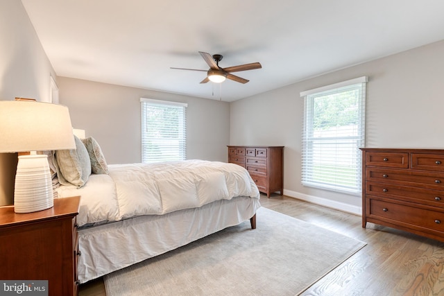 2100 Pot Spring Rd, Lutherville Timonium, MD 21093 - bedroom with light wood finished floors and a ceiling fan