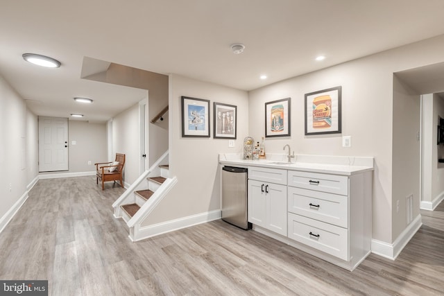 2100 Pot Spring Rd, Lutherville Timonium, MD 21093 - indoor wet bar featuring light wood-type flooring, fridge, stairs, and recessed lighting