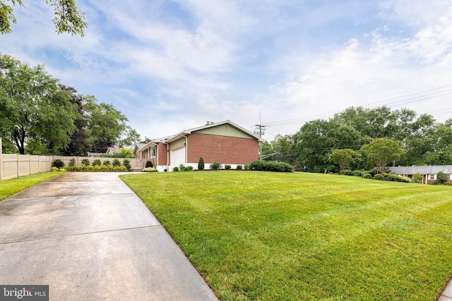 2100 Pot Spring Rd, Lutherville Timonium, MD 21093 - view of property exterior featuring driveway, brick siding, and a garage