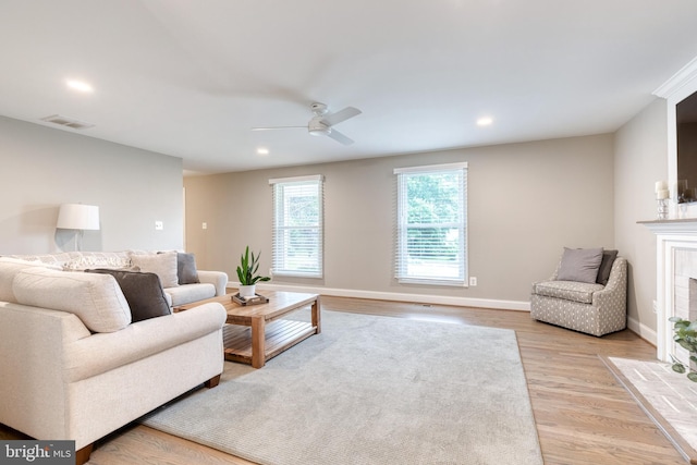 2100 Pot Spring Rd, Lutherville Timonium, MD 21093 - living room featuring a ceiling fan, light wood-type flooring, recessed lighting, and a fireplace