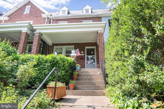 3905 Benton St NW, Washington, DC 20007 - view of front facade with brick siding and covered porch