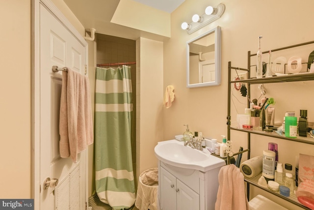 3905 Benton St NW, Washington, DC 20007 - full bathroom with vanity and a shower with shower curtain