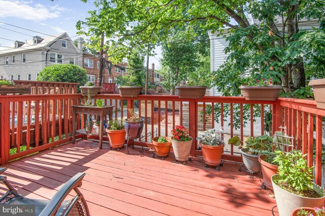 3905 Benton St NW, Washington, DC 20007 - wooden deck featuring a residential view