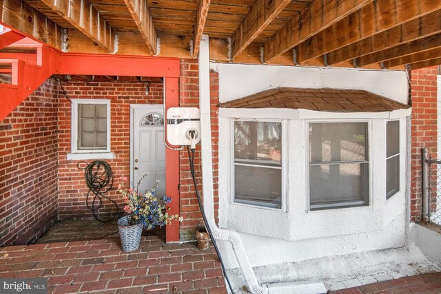 3905 Benton St NW, Washington, DC 20007 - doorway to property featuring brick siding