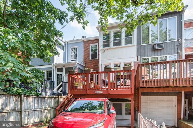 3905 Benton St NW, Washington, DC 20007 - rear view of house featuring a garage and brick siding