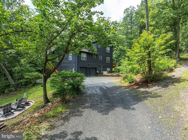5171 Sandy Stone Ln, Broad Run, VA 20137 - view of front of home with driveway and a garage