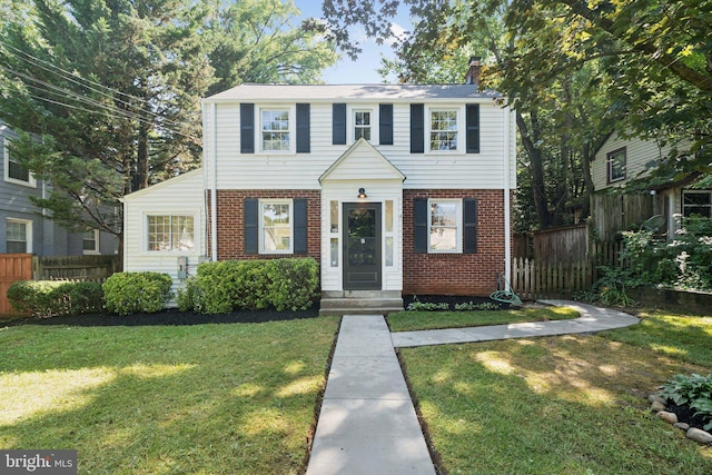 9215 Glenville Rd, Silver Spring, MD 20901 - view of front of home featuring brick siding and a chimney