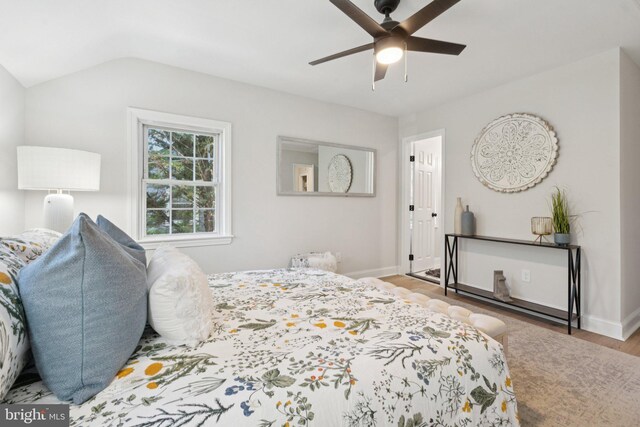 9215 Glenville Rd, Silver Spring, MD 20901 - bedroom with wood finished floors, vaulted ceiling, and a ceiling fan