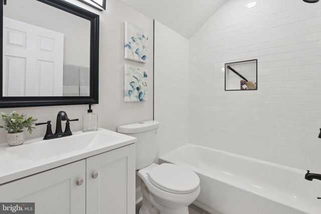 9215 Glenville Rd, Silver Spring, MD 20901 - full bathroom featuring lofted ceiling, vanity, and shower / bath combination