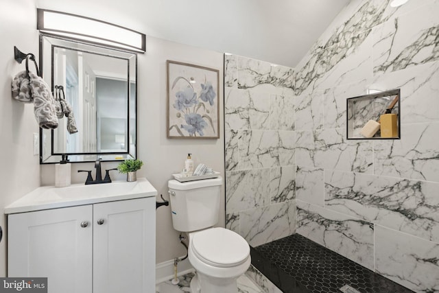 9215 Glenville Rd, Silver Spring, MD 20901 - bathroom with marble look tile flooring, vanity, and a tile shower