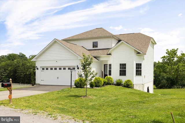 45 Niagara Ct, Falling Waters, WV 25419 - traditional-style house featuring concrete driveway, roof with shingles, a garage, and a front lawn