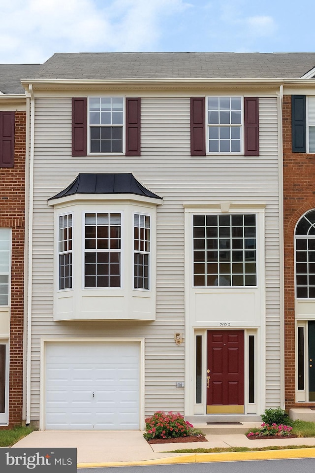 205 Langley Ct, Stafford, VA 22554 - townhome / multi-family property featuring a garage