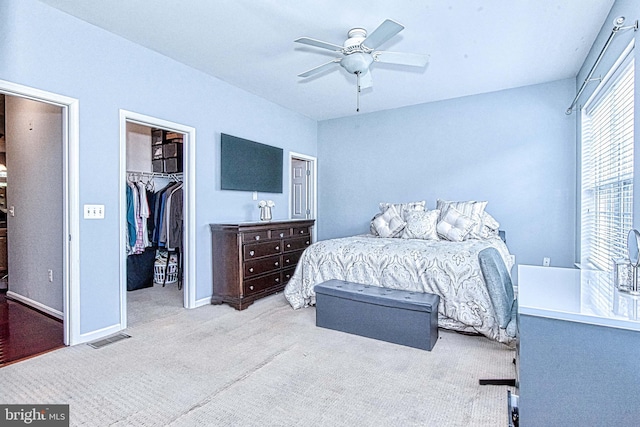 13812 Breezy Ridge Way Unit 101, Woodbridge, VA 22191 - carpeted bedroom featuring a closet, a spacious closet, and a ceiling fan