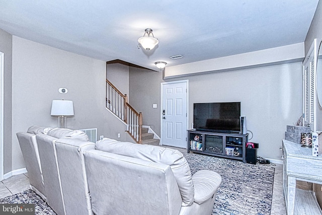 13812 Breezy Ridge Way Unit 101, Woodbridge, VA 22191 - living area with stairway and baseboards