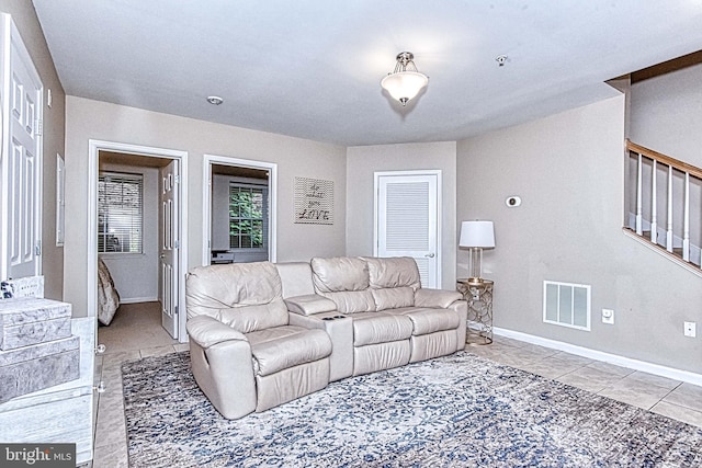13812 Breezy Ridge Way Unit 101, Woodbridge, VA 22191 - tiled living area with stairs and baseboards