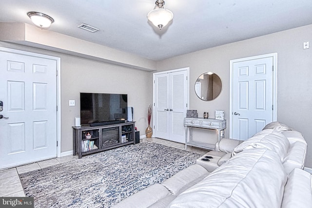 13812 Breezy Ridge Way Unit 101, Woodbridge, VA 22191 - living room with tile patterned flooring and baseboards