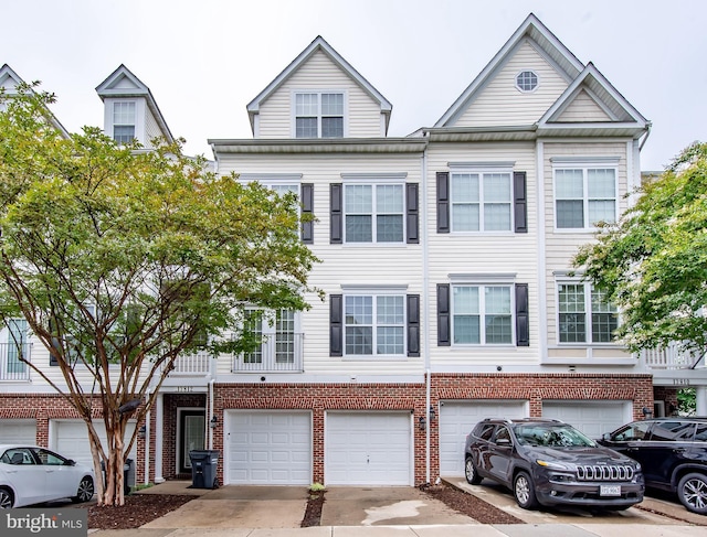 13812 Breezy Ridge Way Unit 101, Woodbridge, VA 22191 - view of property with an attached garage, driveway, and brick siding