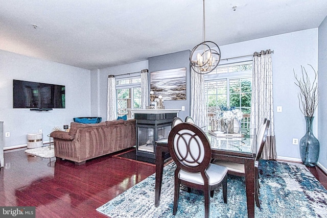 13812 Breezy Ridge Way Unit 101, Woodbridge, VA 22191 - dining area featuring dark wood-type flooring and a chandelier