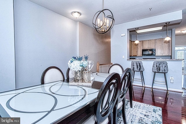 13812 Breezy Ridge Way Unit 101, Woodbridge, VA 22191 - dining room with a chandelier and wood finished floors