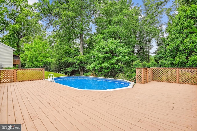 1302 Terry Way, Fallston, MD 21047 - swimming pool with a wooden deck and view of scattered trees