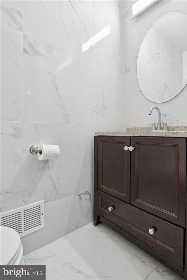 42 Frost Ln, Hightstown, NJ 08520 - half bath with vanity and marble finish flooring