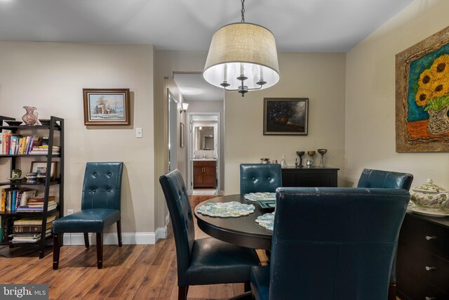 432 Old Forge Xing Unit 432, Devon, PA 19333 - dining area with wood finished floors and baseboards