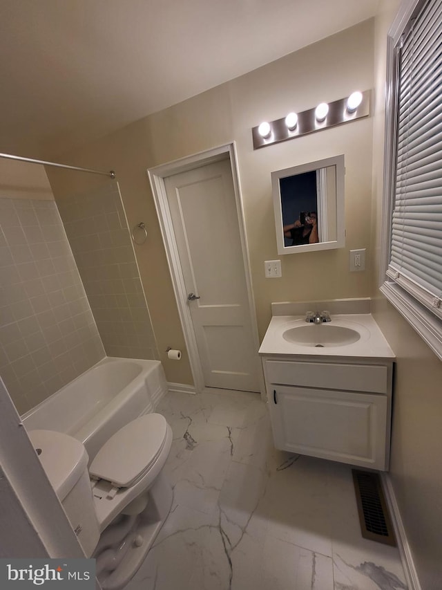 501 Tunstall Ave, Blackstone, VA 23824 - bathroom with marble finish floors, vanity, healthy amount of natural light, and washtub / shower combination