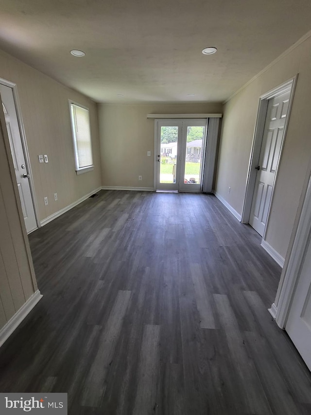 501 Tunstall Ave, Blackstone, VA 23824 - spare room with dark wood-style floors, healthy amount of natural light, and recessed lighting