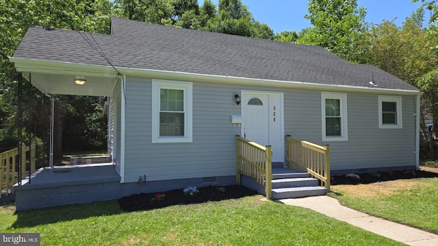 501 Tunstall Ave, Blackstone, VA 23824 - bungalow with crawl space, a front lawn, and roof with shingles