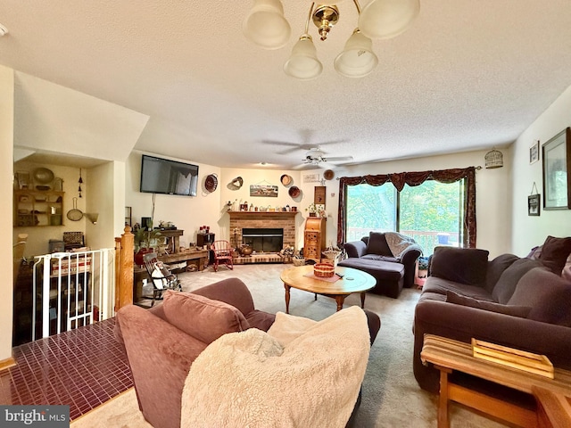 102 Tecumseh Trl, Hedgesville, WV 25427 - carpeted living area with ceiling fan, a brick fireplace, and a textured ceiling