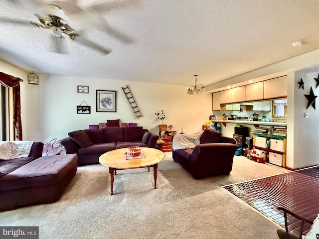 102 Tecumseh Trl, Hedgesville, WV 25427 - carpeted living area with a chandelier, a ceiling fan, and a textured ceiling