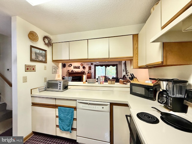 102 Tecumseh Trl, Hedgesville, WV 25427 - kitchen featuring dishwasher, black microwave, light countertops, under cabinet range hood, and a textured ceiling