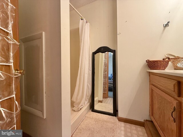 102 Tecumseh Trl, Hedgesville, WV 25427 - full bath with tile patterned floors, vanity, and a shower with curtain