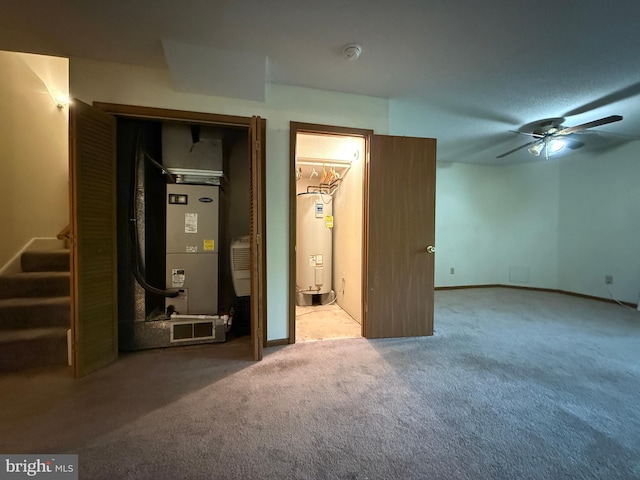 102 Tecumseh Trl, Hedgesville, WV 25427 - finished basement with electric water heater, carpet flooring, heating unit, stairway, and a ceiling fan