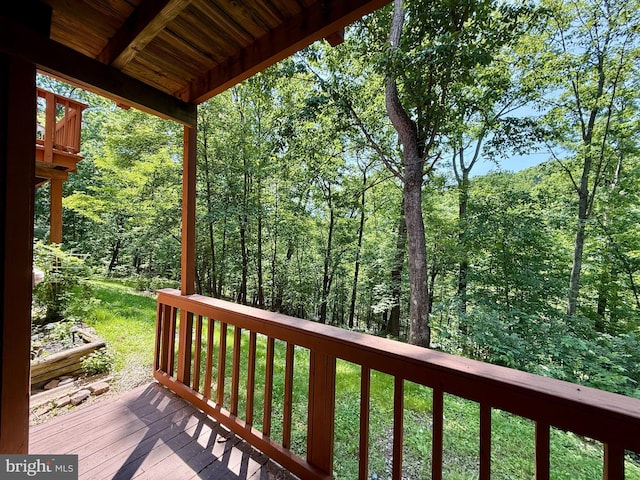 102 Tecumseh Trl, Hedgesville, WV 25427 - wooden terrace featuring a wooded view