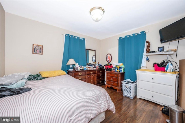 6612 Stockton Ln, Hyattsville, MD 20784 - bedroom with dark wood-style floors