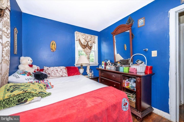 6612 Stockton Ln, Hyattsville, MD 20784 - bedroom with wood finished floors and baseboards