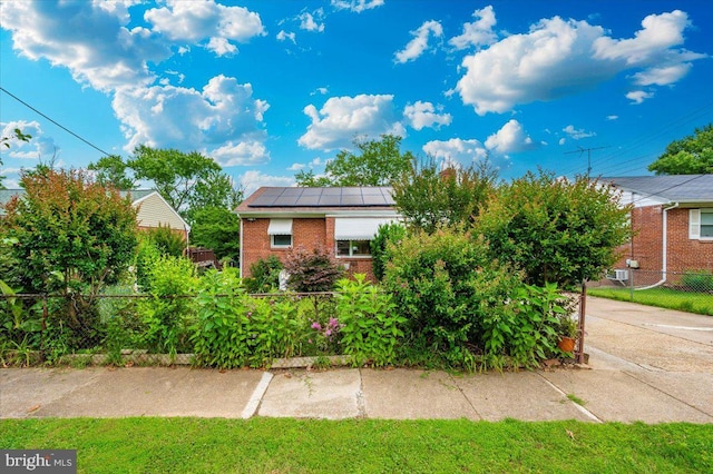 6612 Stockton Ln, Hyattsville, MD 20784 - view of front of house with brick siding and solar panels