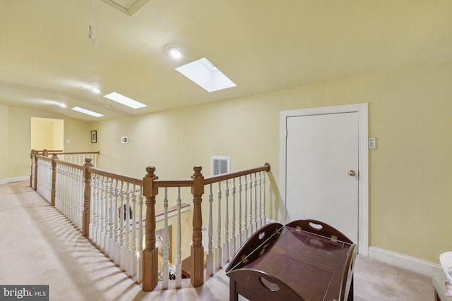 28 Cliff Rd, Front Royal, VA 22630 - hall with carpet flooring, a skylight, and an upstairs landing