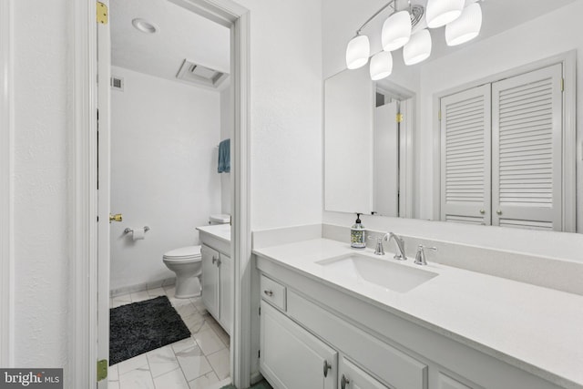 28 Cliff Rd, Front Royal, VA 22630 - bathroom featuring vanity, marble look tiles, and a closet