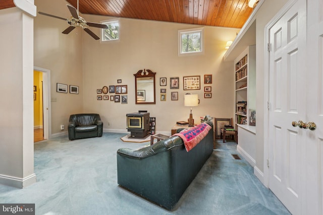 28 Cliff Rd, Front Royal, VA 22630 - living area featuring wood ceiling, carpet floors, healthy amount of natural light, ceiling fan, and a wood stove