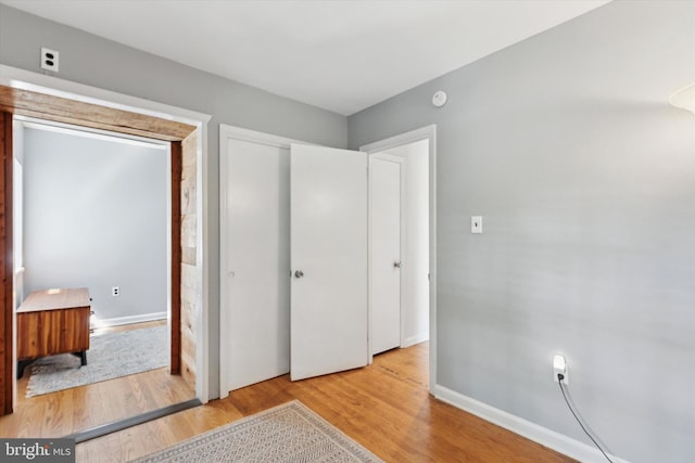 1410 Butler Pike, Conshohocken, PA 19428 - unfurnished bedroom featuring wood finished floors and a closet