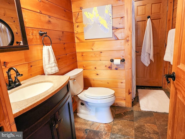 1870 General Potter Hwy, Centre Hall, PA 16828 - bathroom with vanity, stone finish floors, and wood walls