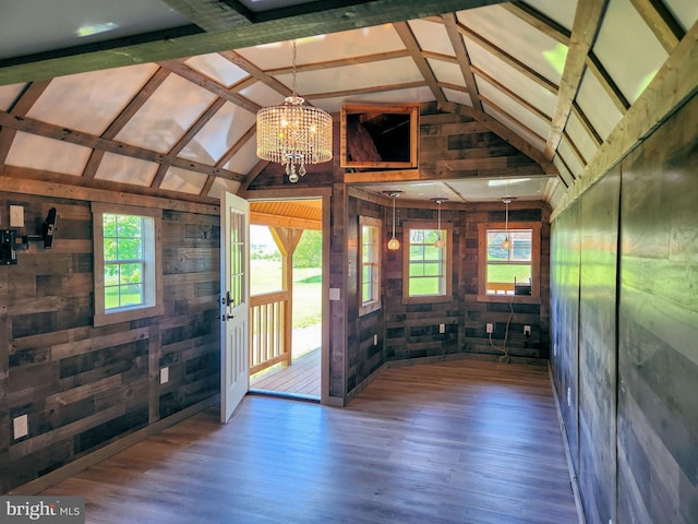 1870 General Potter Hwy, Centre Hall, PA 16828 - entryway with wood walls, vaulted ceiling, wood finished floors, and a chandelier