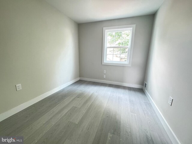 10105 Irongate Way, Manassas, VA 20109 - empty room with wood finished floors and baseboards