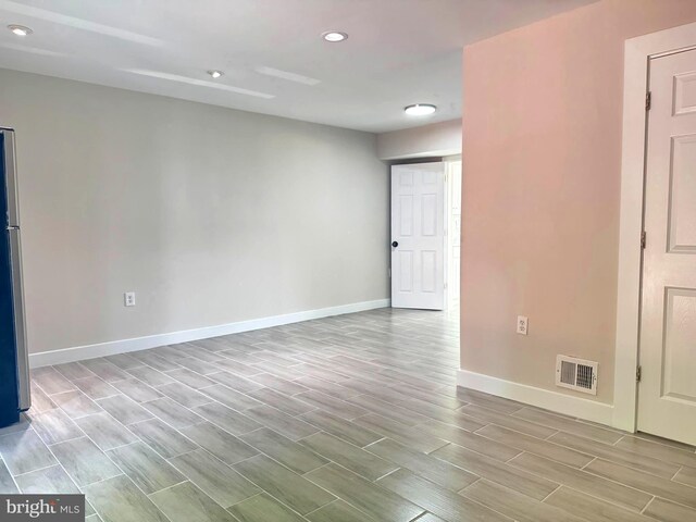 10105 Irongate Way, Manassas, VA 20109 - spare room featuring wood finish floors and recessed lighting