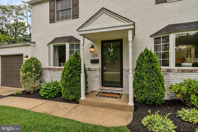 605 Lakevue Dr, Willow Grove, PA 19090 - property entrance featuring an attached garage and stucco siding