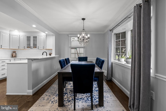 605 Lakevue Dr, Willow Grove, PA 19090 - dining room featuring dark wood-type flooring, a chandelier, crown molding, baseboards, and recessed lighting