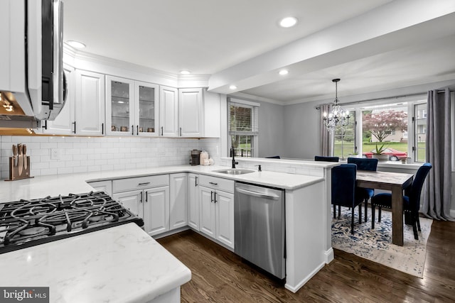 605 Lakevue Dr, Willow Grove, PA 19090 - kitchen with stainless steel appliances, a peninsula, a sink, a chandelier, and healthy amount of natural light